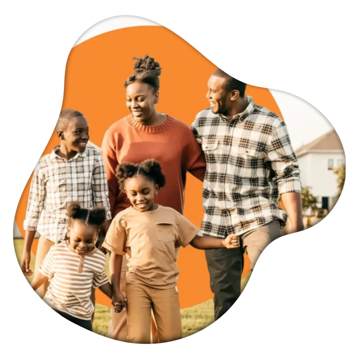 A family walking together outside their home